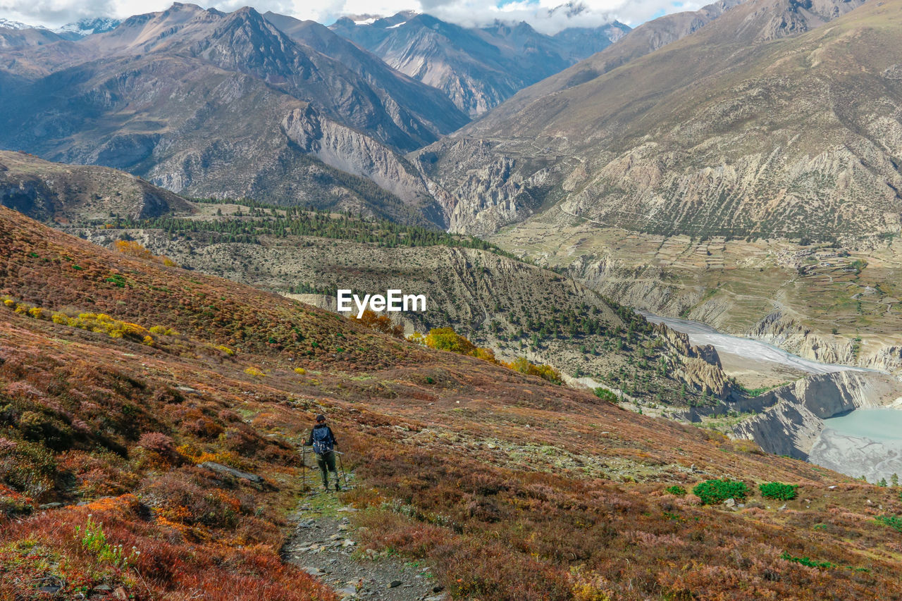 Woman hiking on mountain