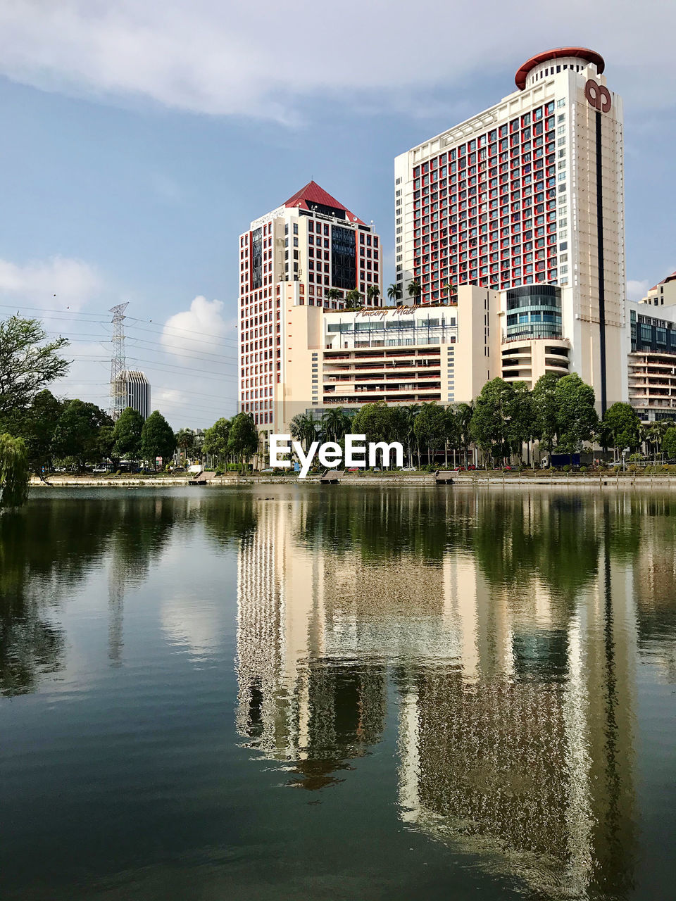 REFLECTION OF BUILDINGS ON LAKE