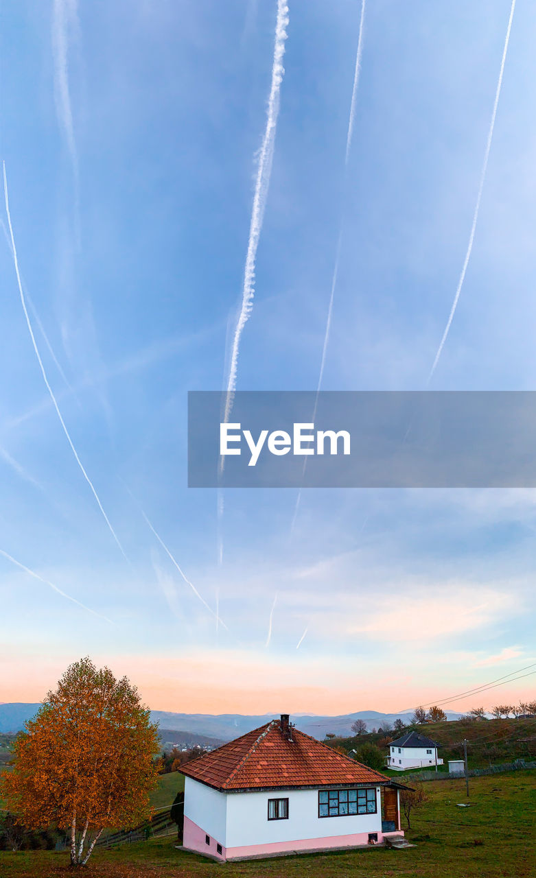 SCENIC VIEW OF VAPOR TRAILS IN SKY