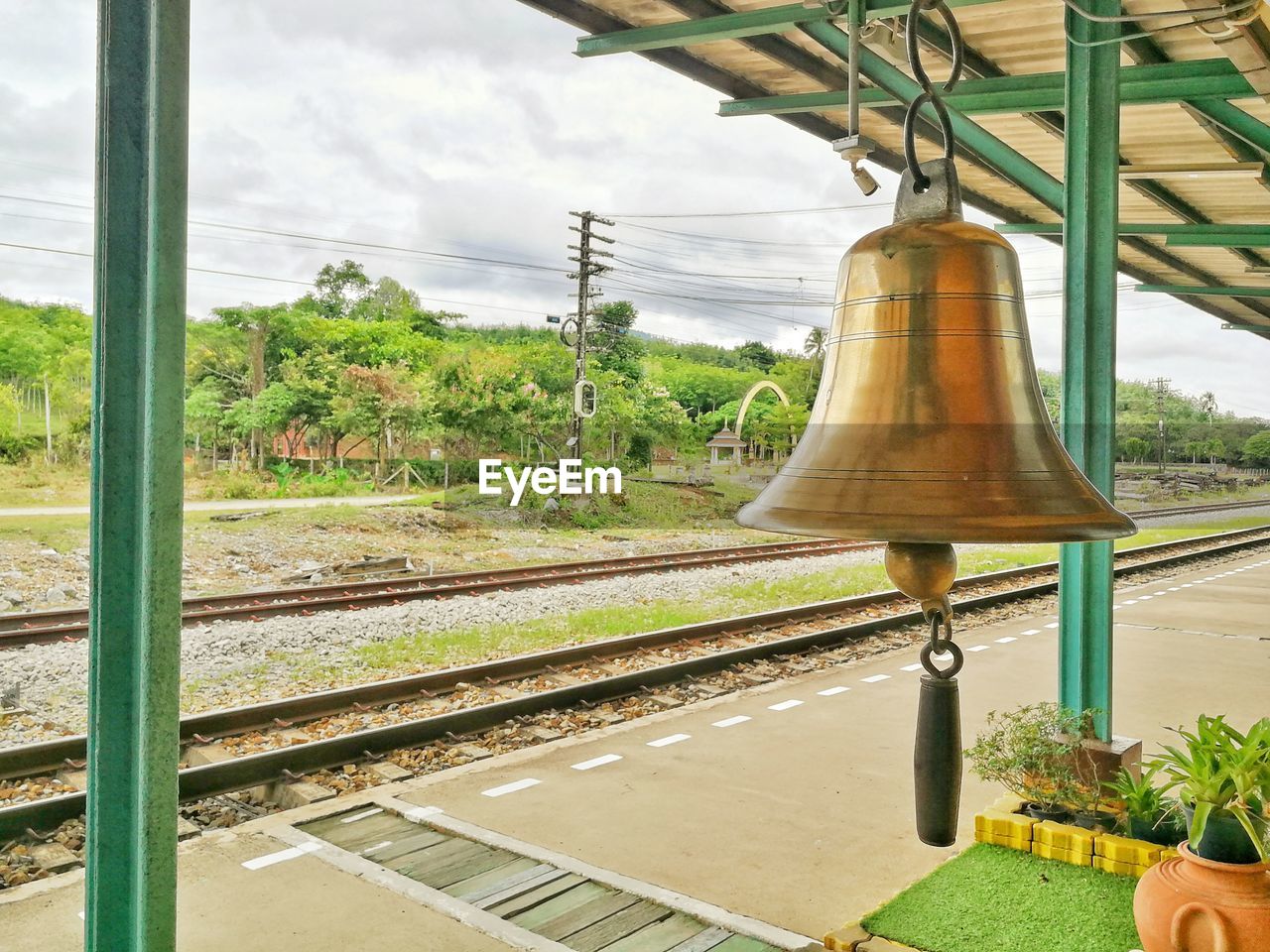 RAILROAD TRACKS SEEN THROUGH WINDOW