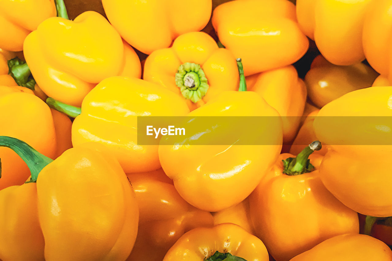 food and drink, yellow, food, healthy eating, wellbeing, freshness, plant, large group of objects, yellow pepper, produce, vegetable, full frame, abundance, backgrounds, no people, fruit, retail, market, close-up, orange color, still life, organic, business finance and industry, for sale