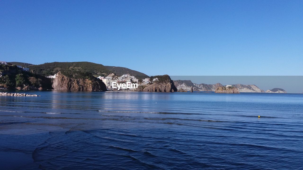 Scenic view of sea against clear sky