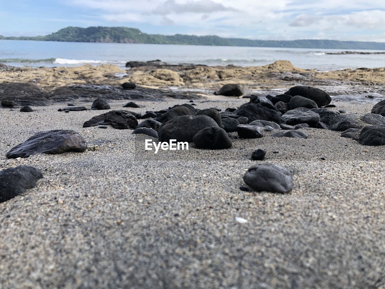 Rocks on shore at beach