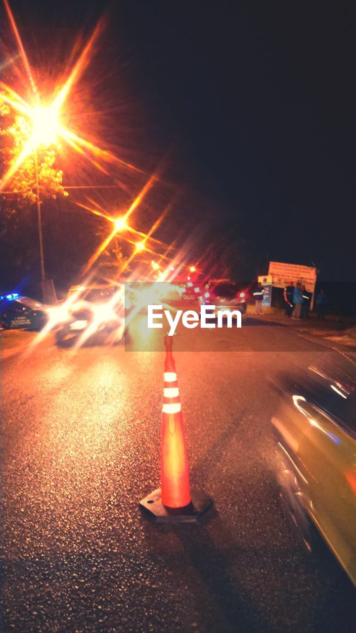 TRAFFIC ON ROAD AT NIGHT