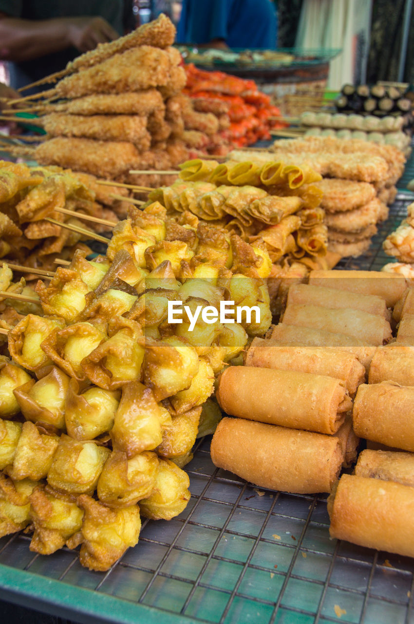 CLOSE-UP OF ROASTED FOR SALE AT MARKET STALL