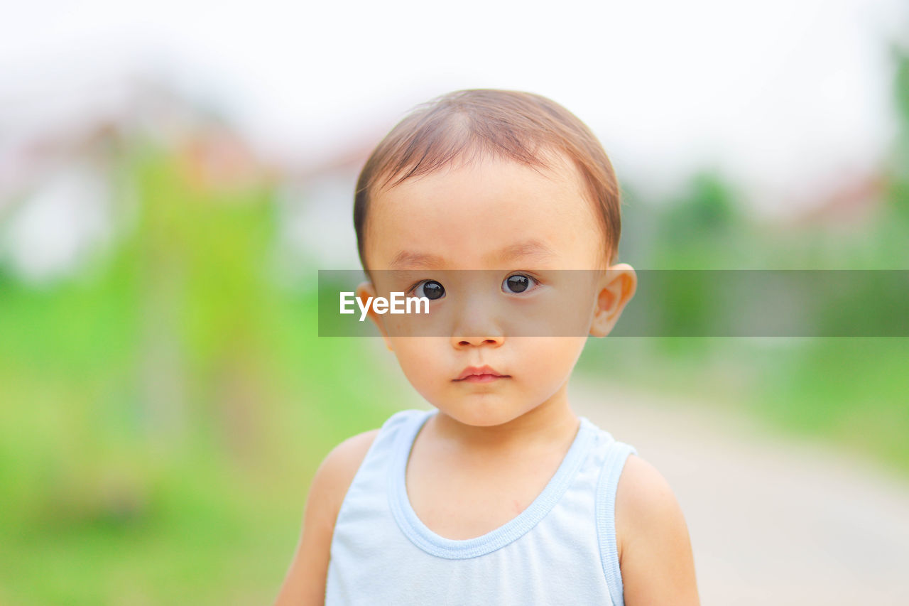 CLOSE-UP PORTRAIT OF CUTE BABY BOY