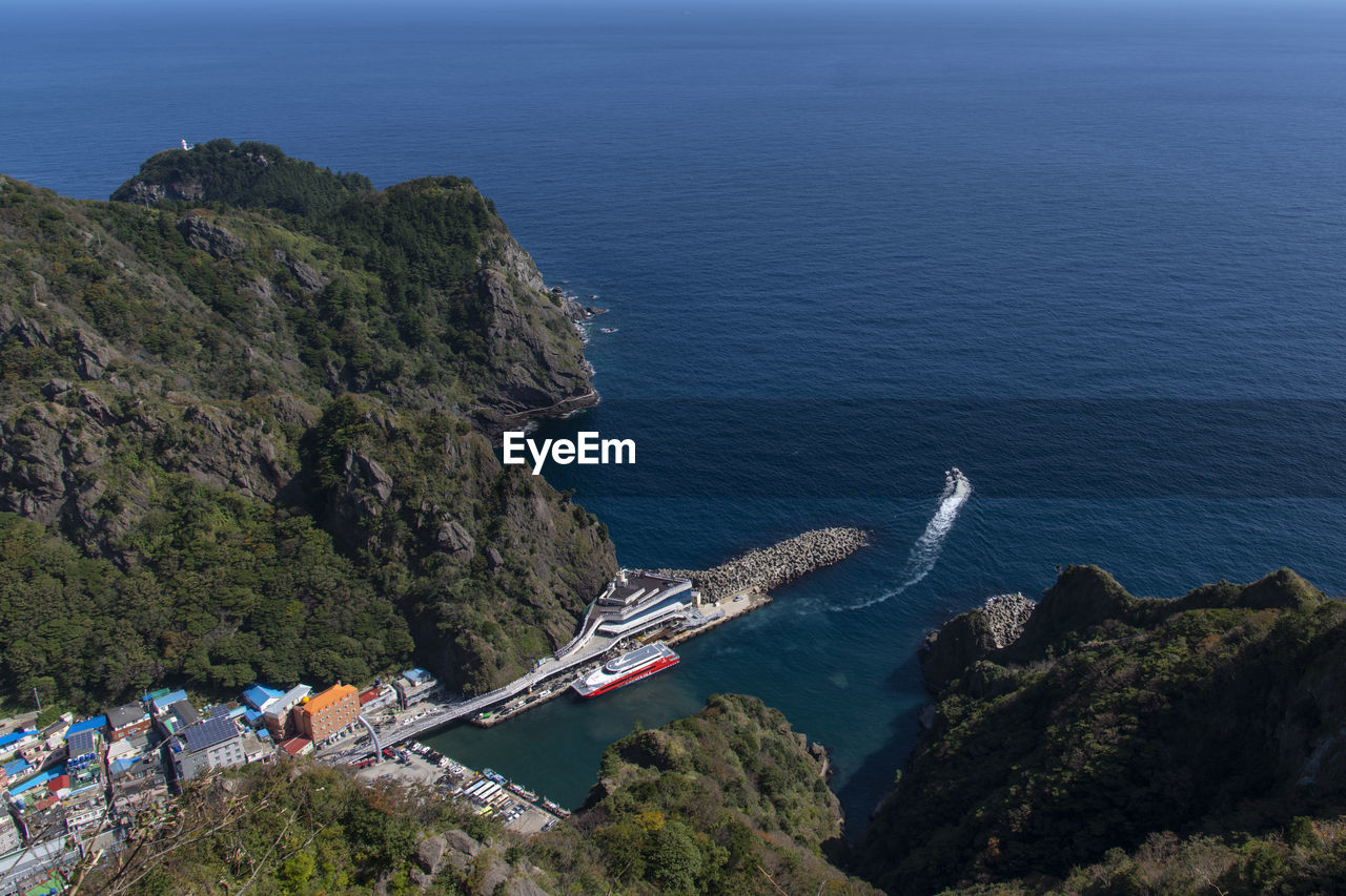 High angle view of sea and mountains