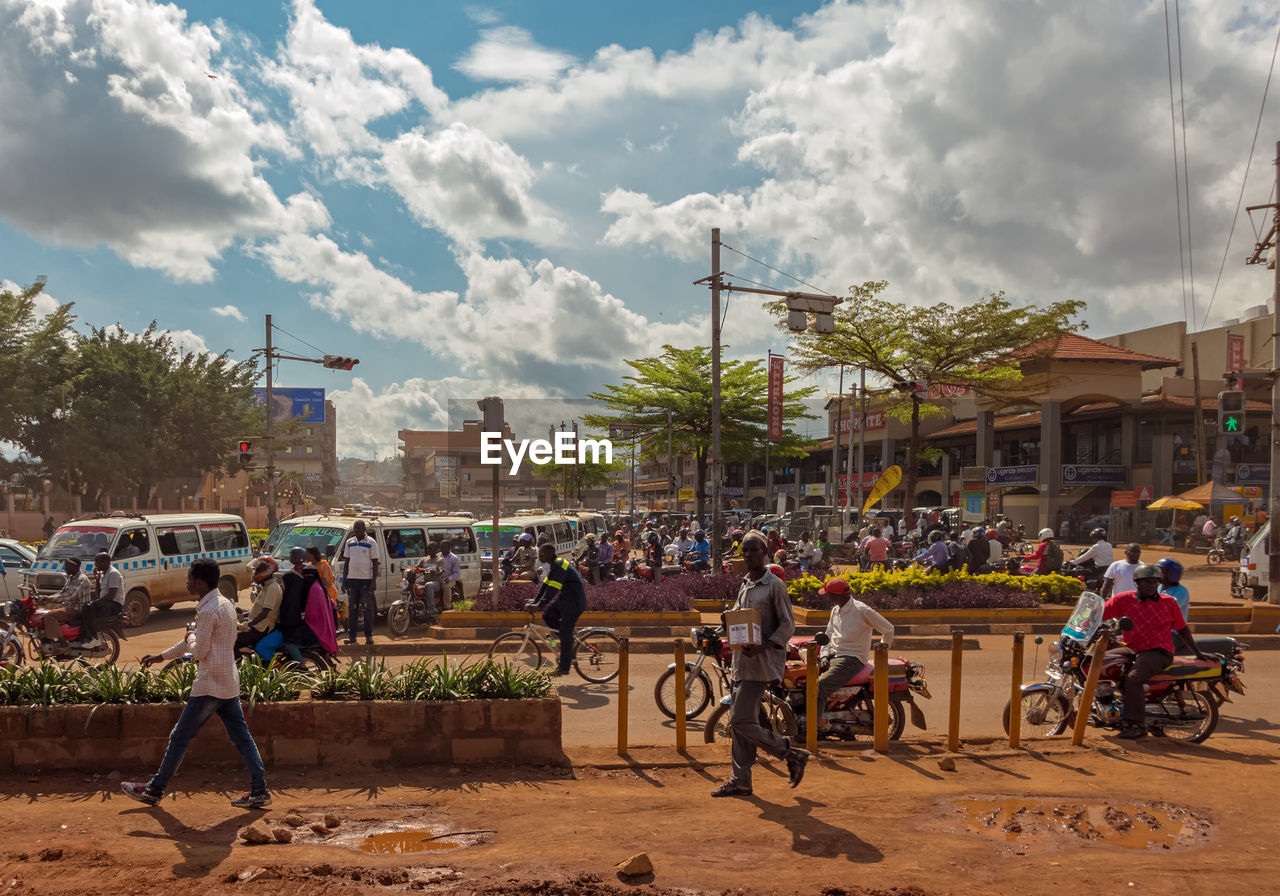 PEOPLE ON STREET IN CITY