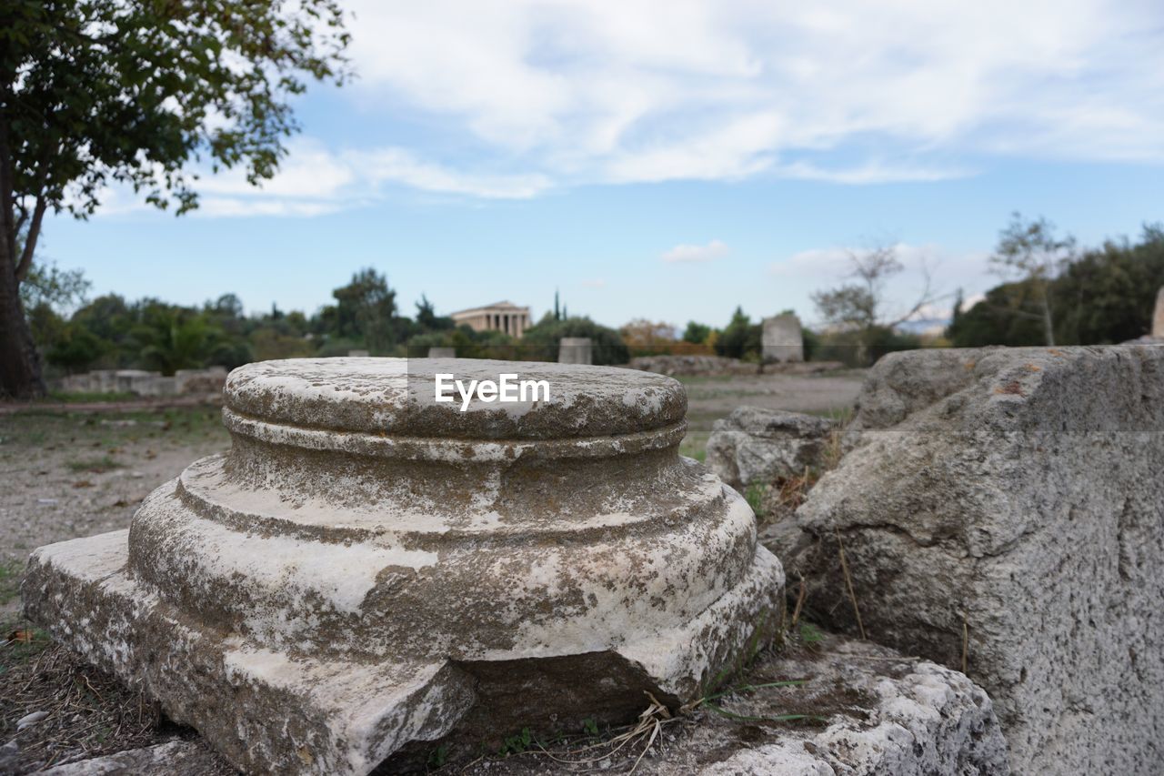 Panoramic view of arcitecture on field against sky