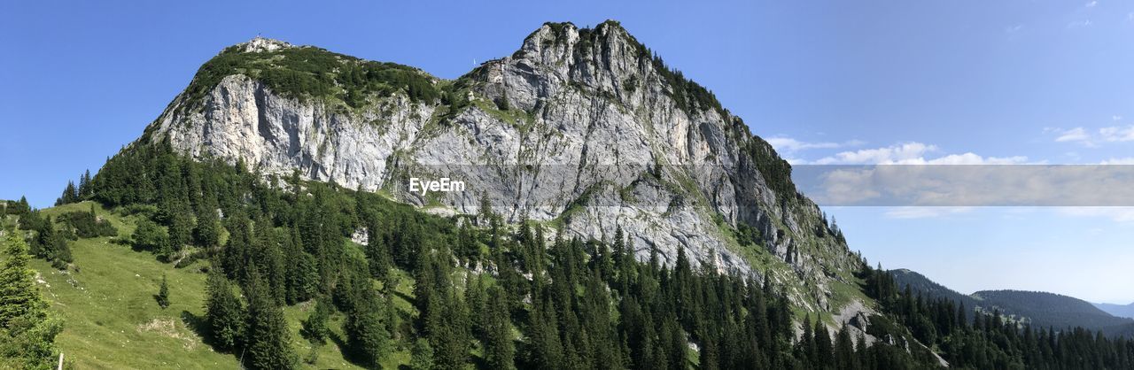 LOW ANGLE VIEW OF ROCK FORMATION AGAINST SKY