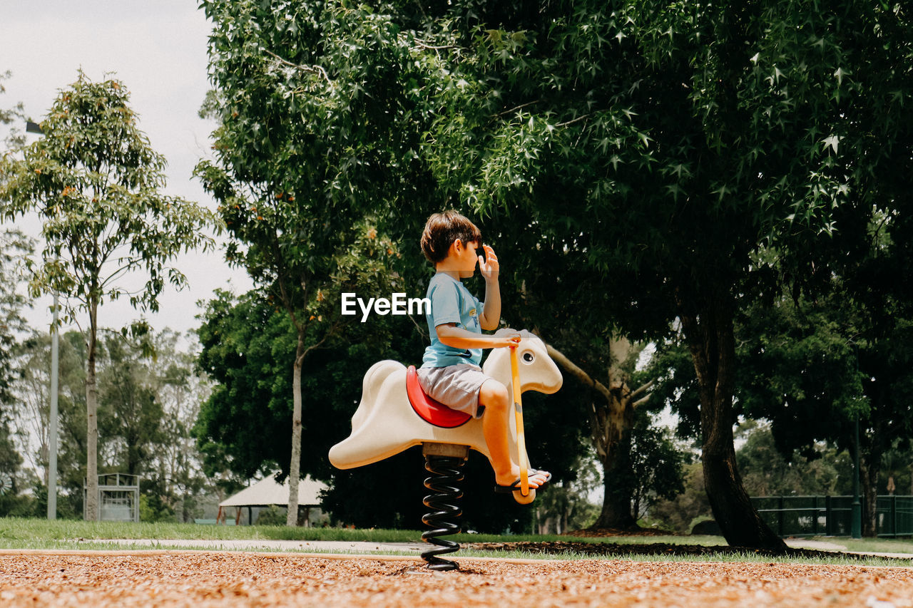 Boy playing in park