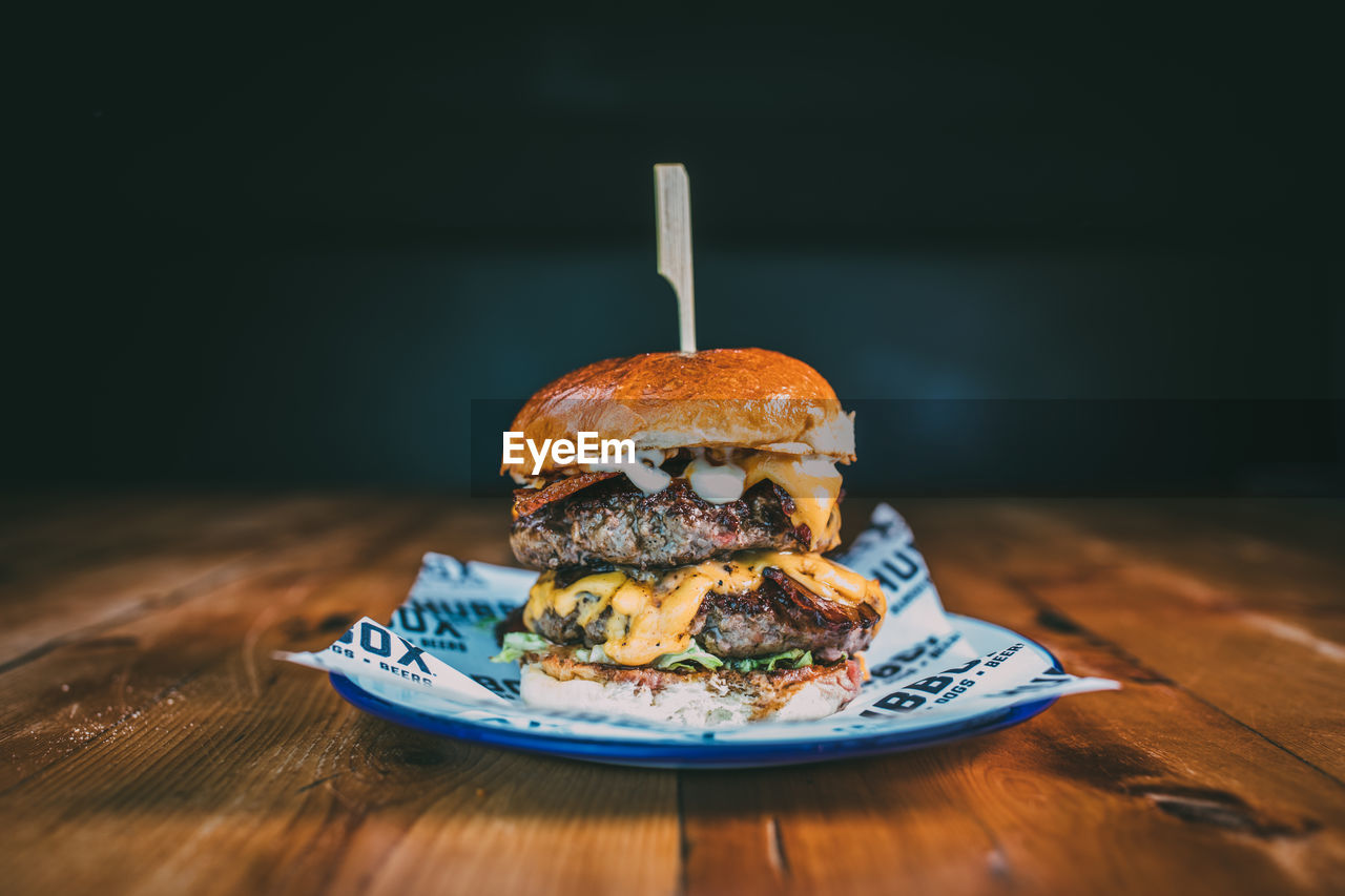 Close-up of burger in plate on table