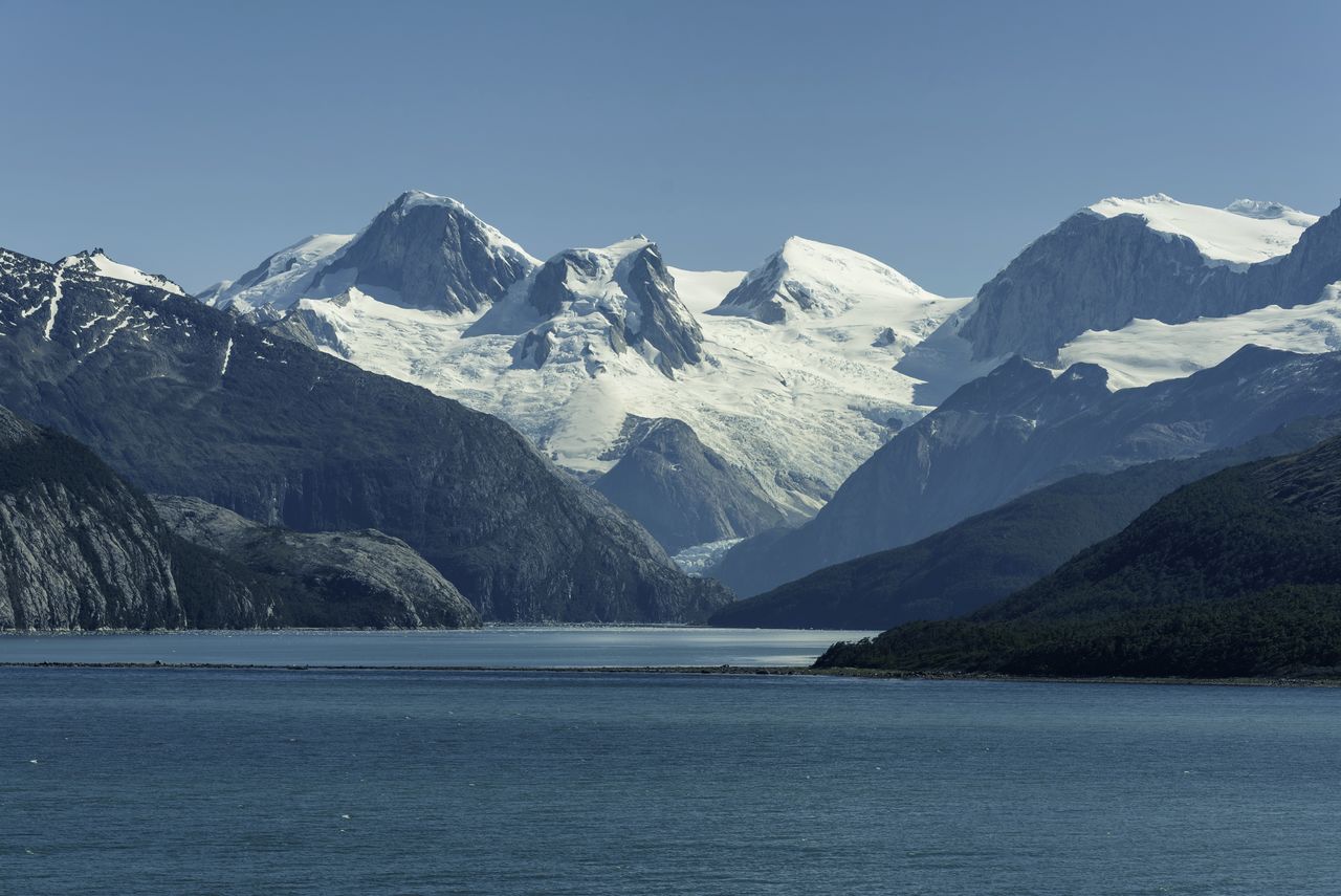 SCENIC VIEW OF SNOWCAPPED MOUNTAIN AGAINST SKY DURING WINTER