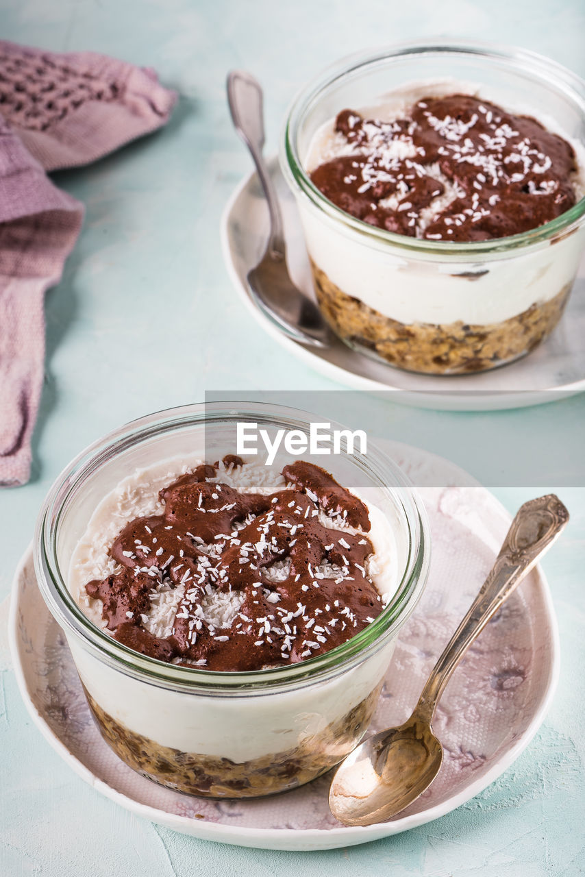 High angle view of desserts in bowls on table