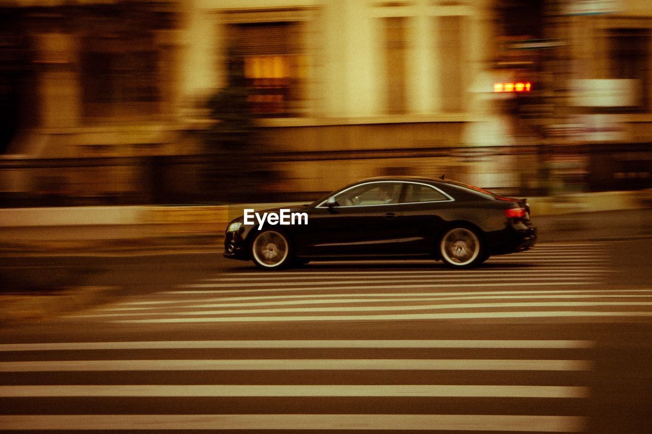 CARS MOVING ON ROAD