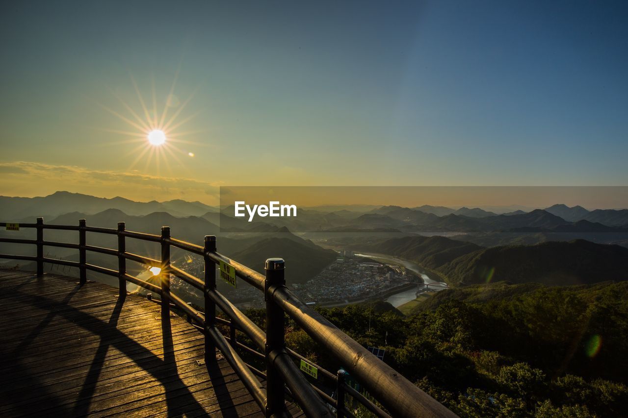 Scenic view of mountains against sky during sunset