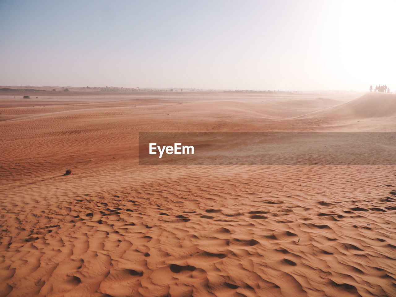 Scenic view of desert against clear sky