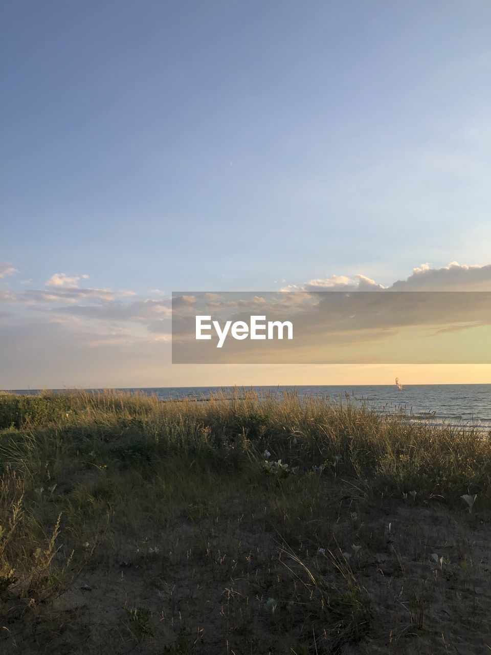 SCENIC VIEW OF SEA DURING SUNSET