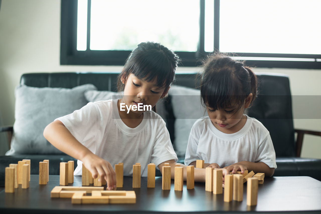 BOYS PLAYING IN RESTAURANT