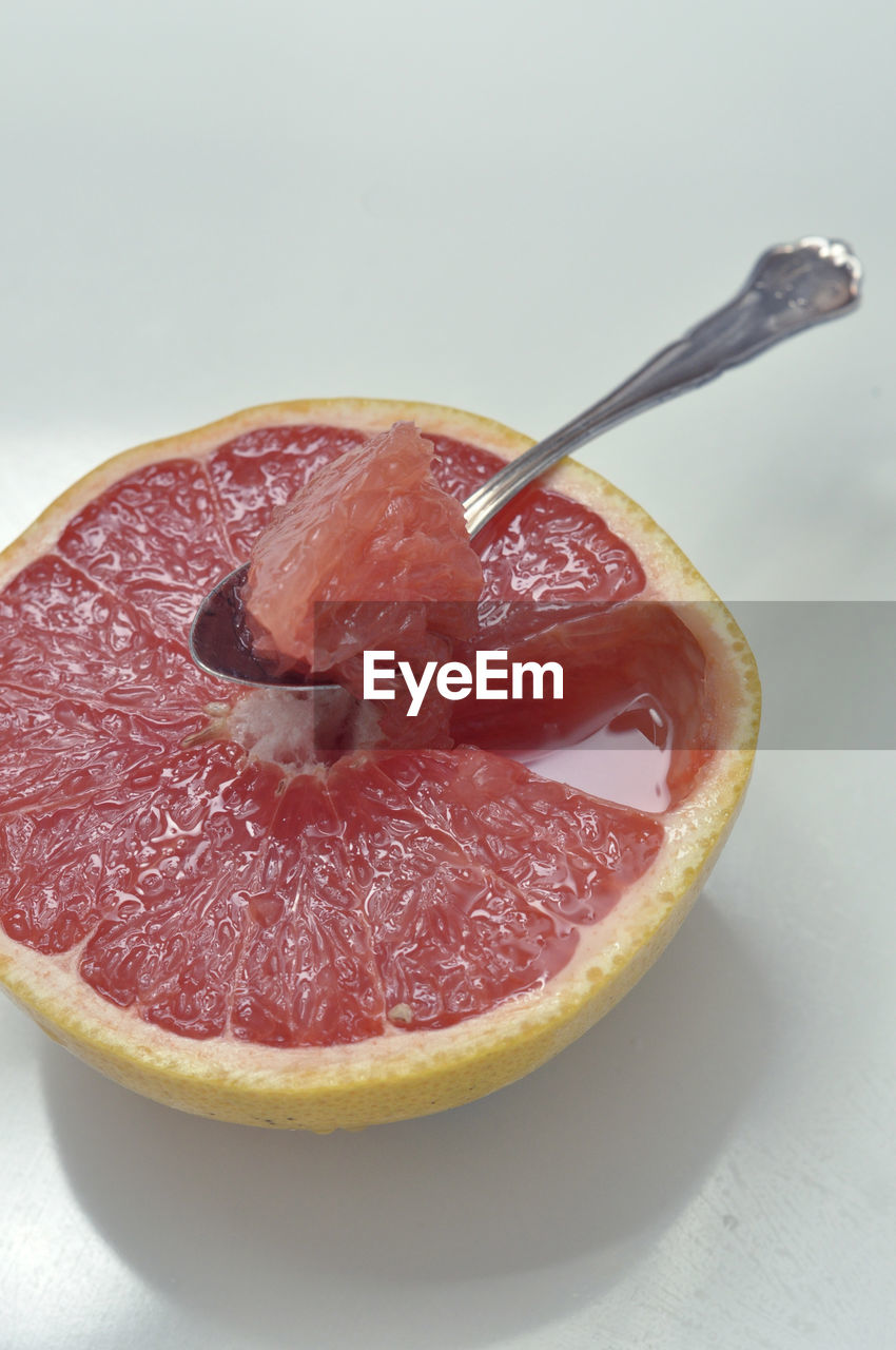 Pink grapefruit half. juicy citrus fruit. healthy lifestyle diet for weight loss. refreshing breggie