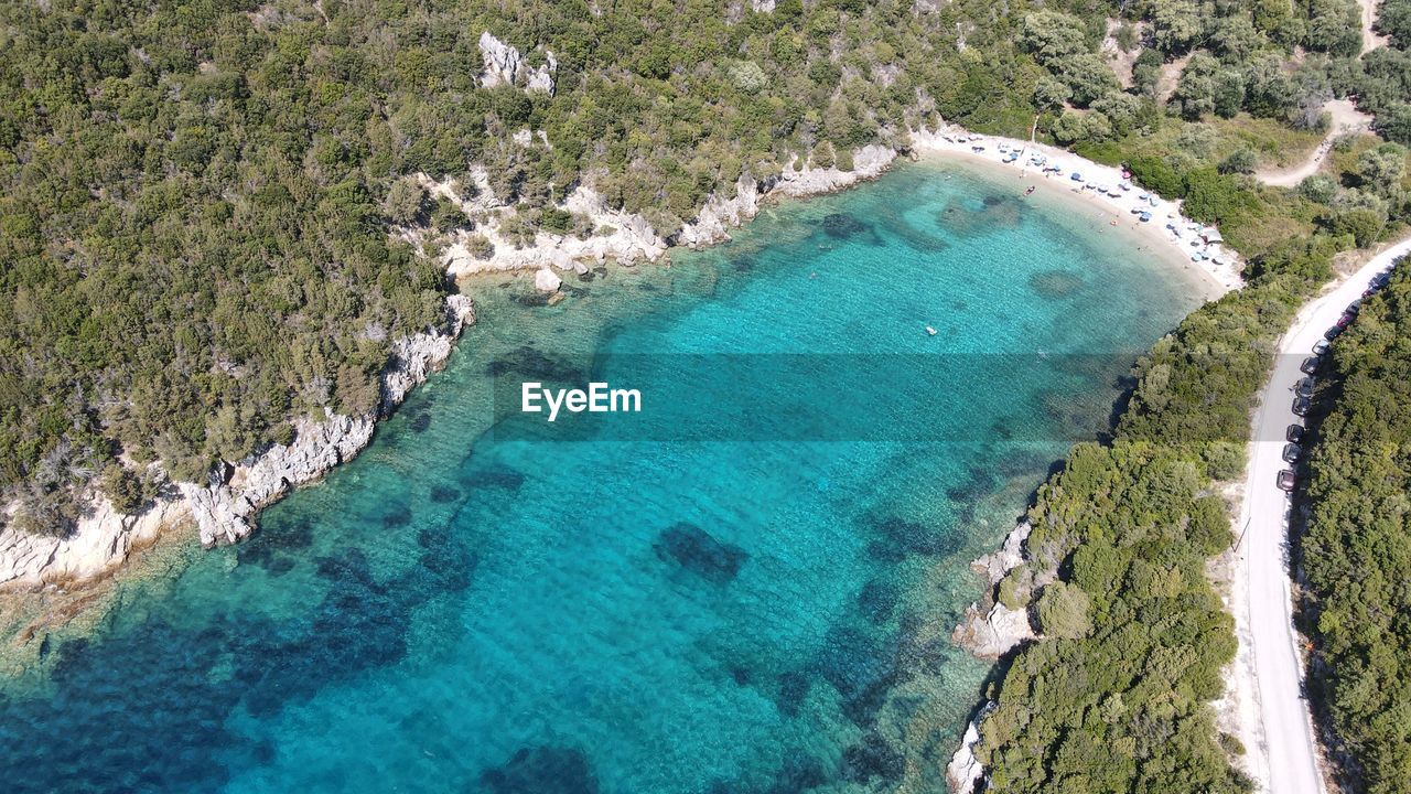 HIGH ANGLE VIEW OF SEA AND SHORE