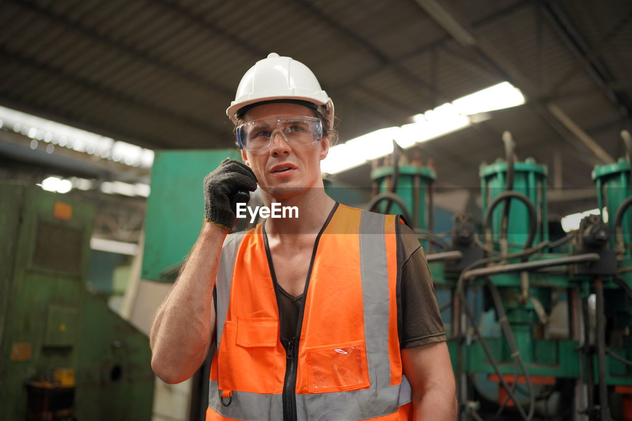 portrait of young man using mobile phone