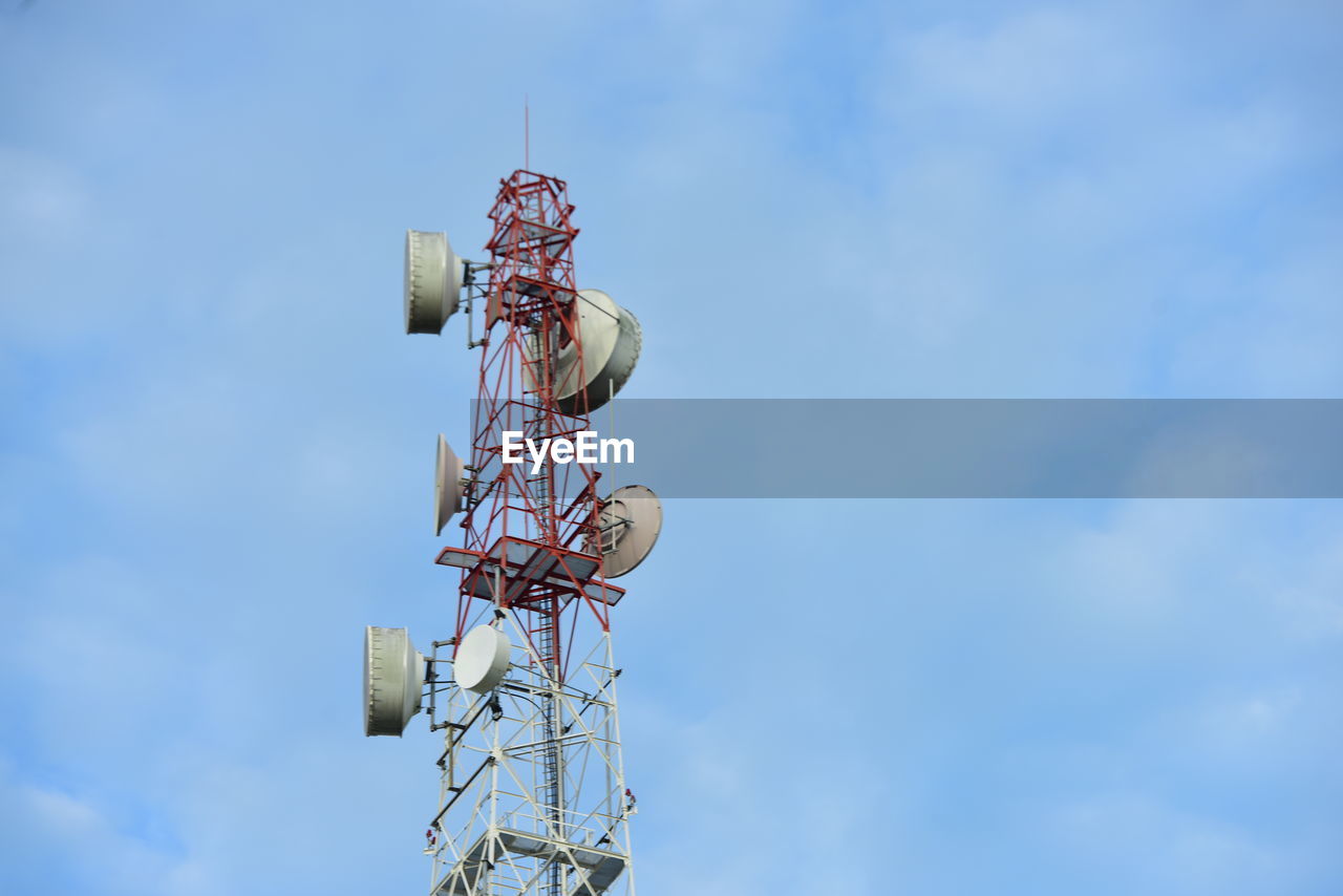 sky, blue, low angle view, technology, cloud, communication, communications tower, nature, day, global communications, broadcasting, no people, tower, telecommunications engineering, wireless technology, outdoors, telecommunications equipment, metal, architecture, lighting, antenna, satellite, electricity, satellite dish, copy space, built structure