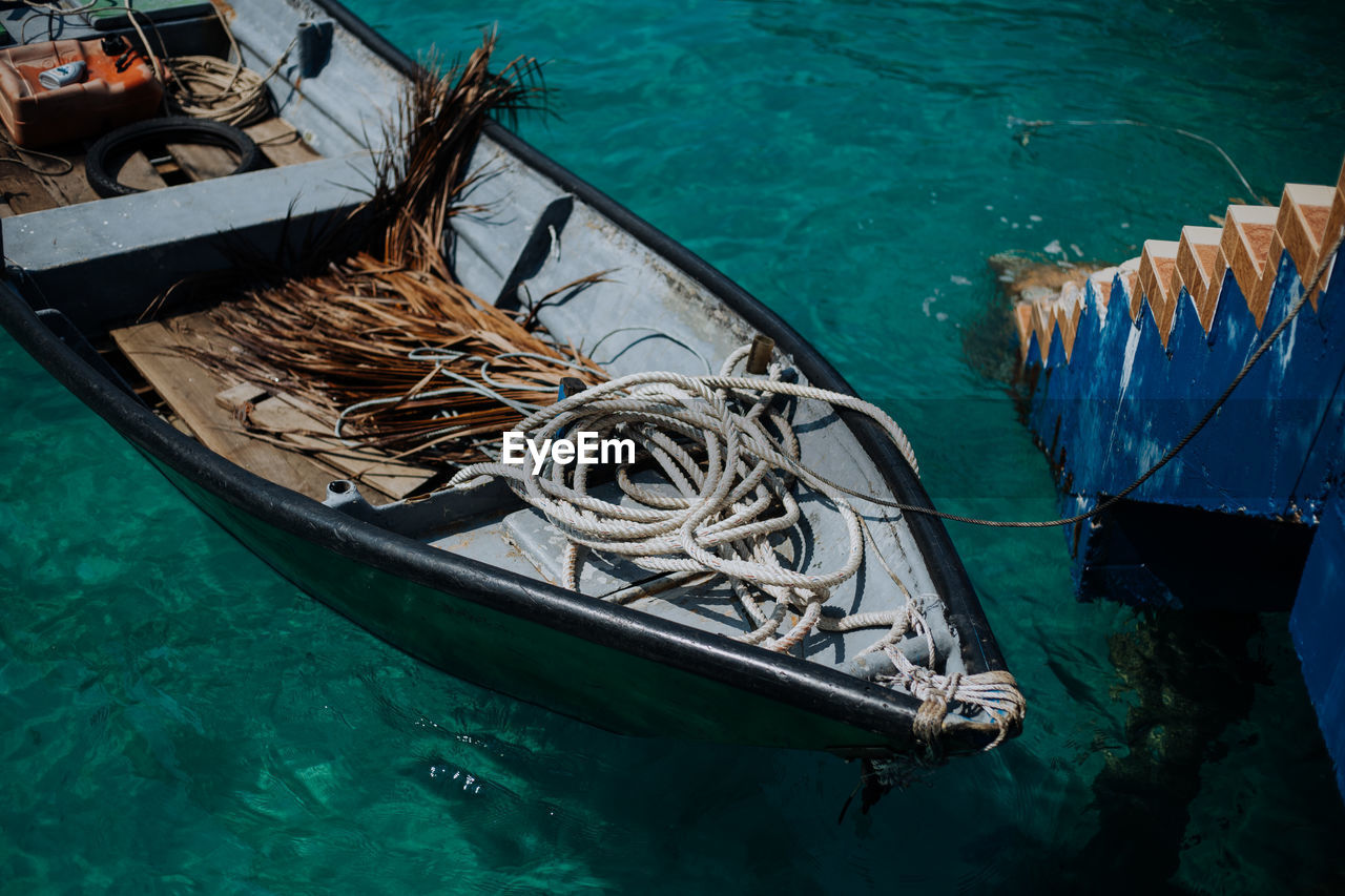 High angle view of fishing boat moored in sea