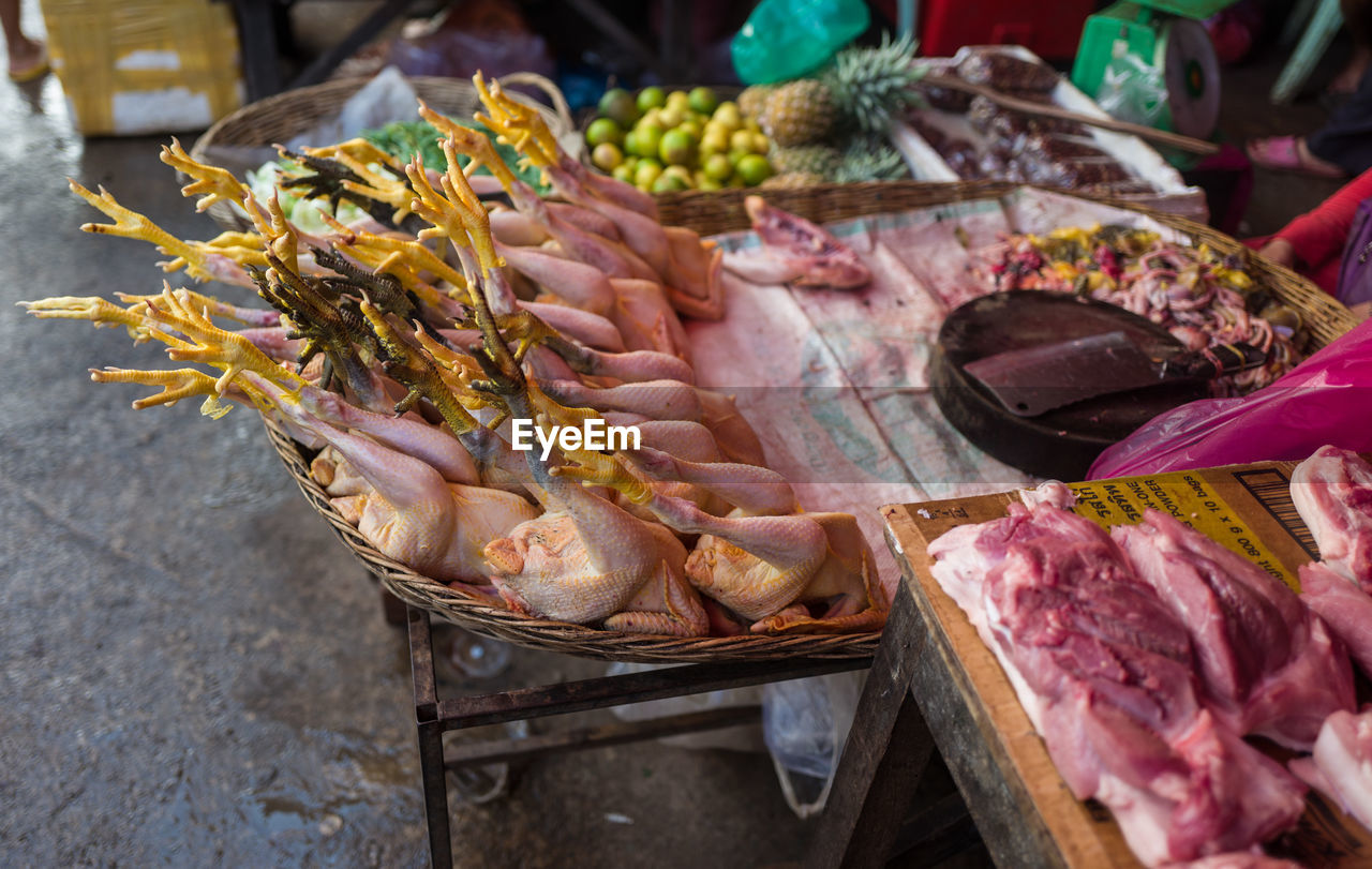 High angle view of chicken meat for sale at market stall