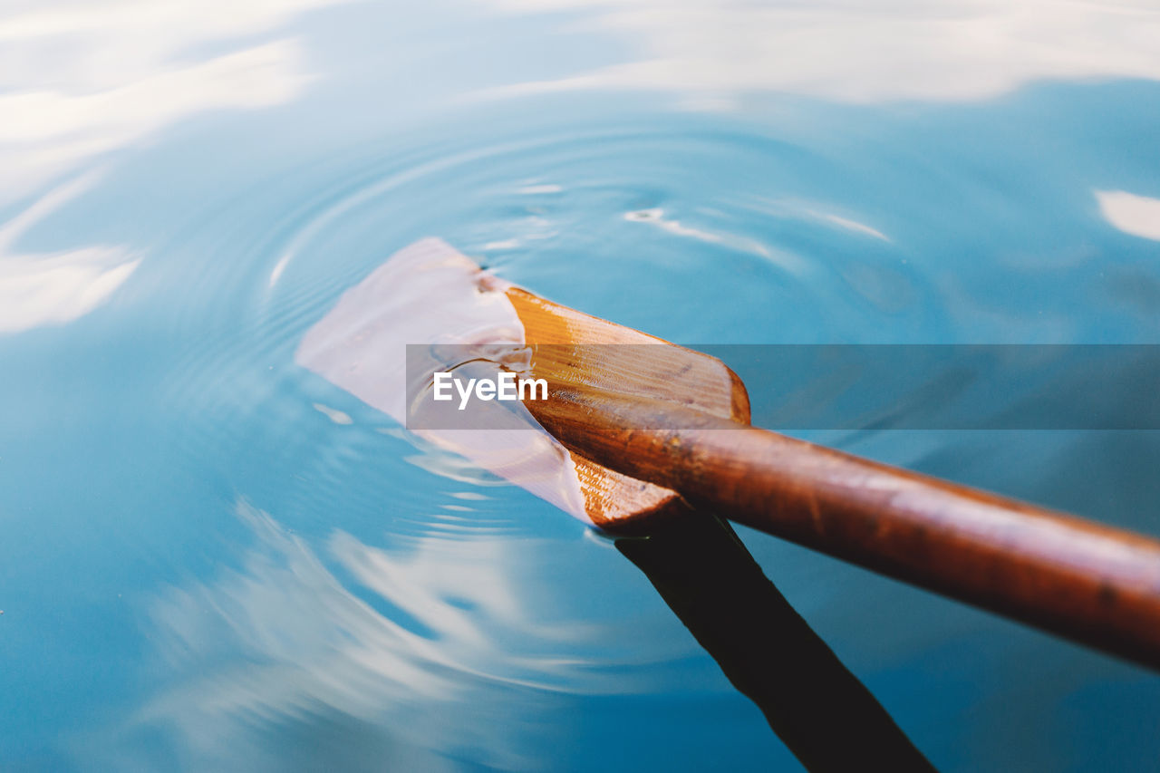 Close-up of oar in water