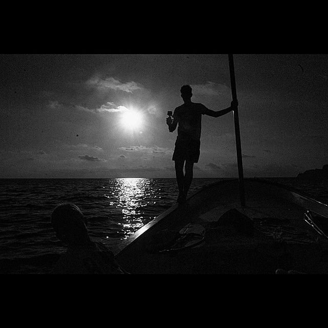 WOMAN JUMPING ON SEA