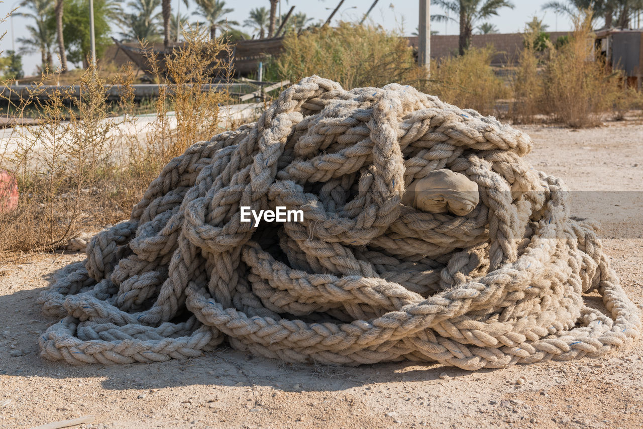 Close-up of rope on the ground