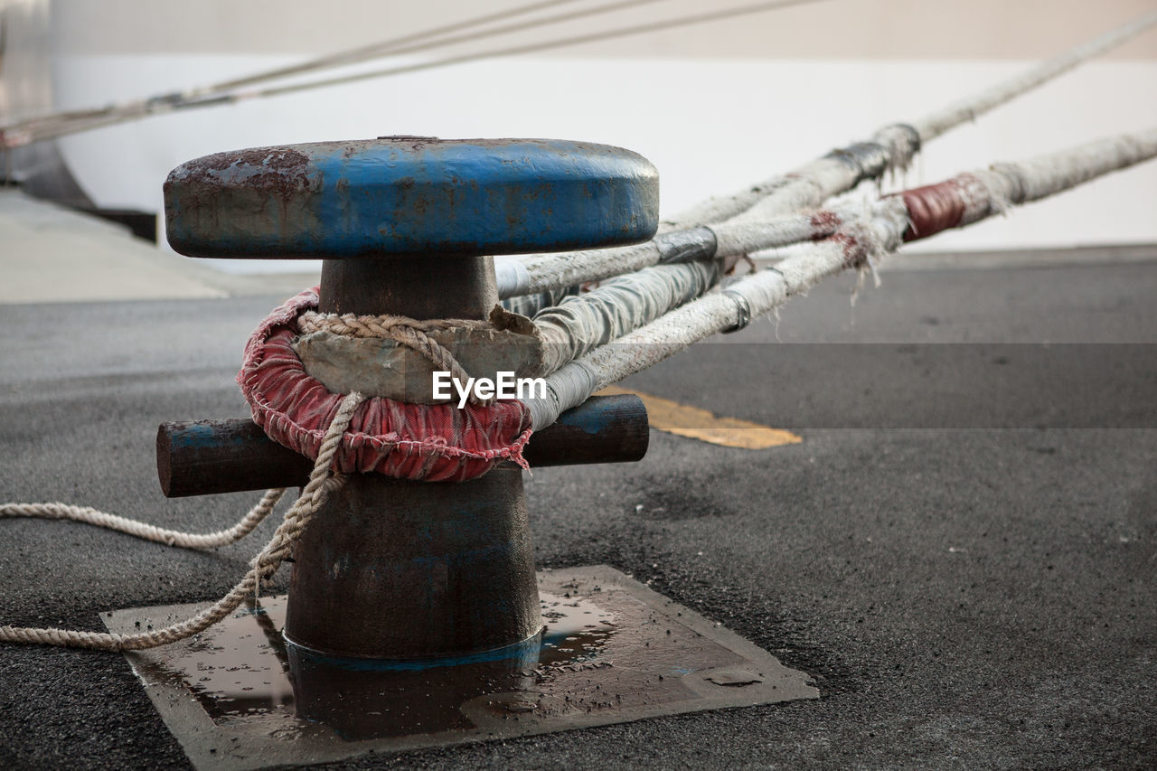 Close-up of mooring bollard