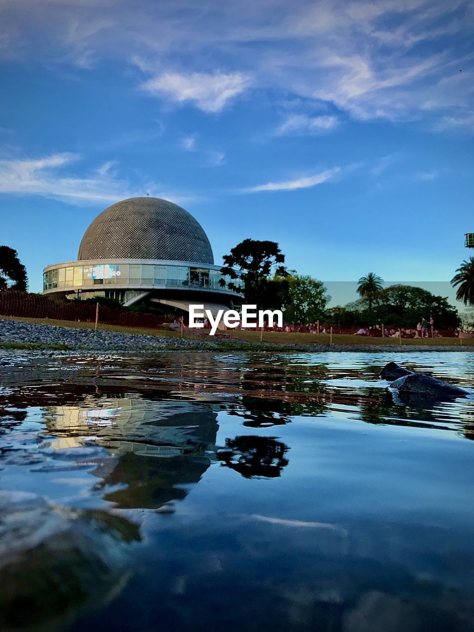 REFLECTION OF BUILDINGS IN LAKE