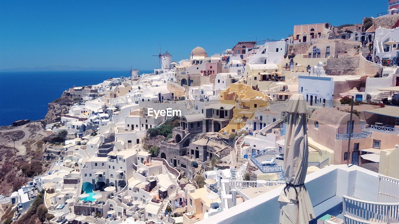 High angle view of town by sea