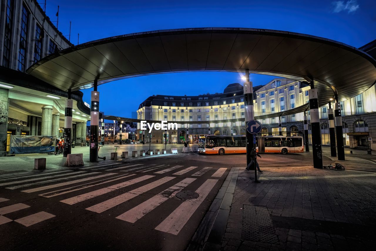 Early morning wide angle view at brussels central station with the hilton hotel in the back