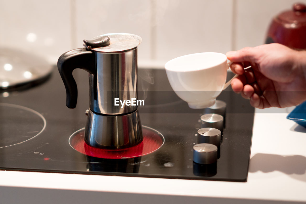 Coffee pot on electric stove. domestic kitchen