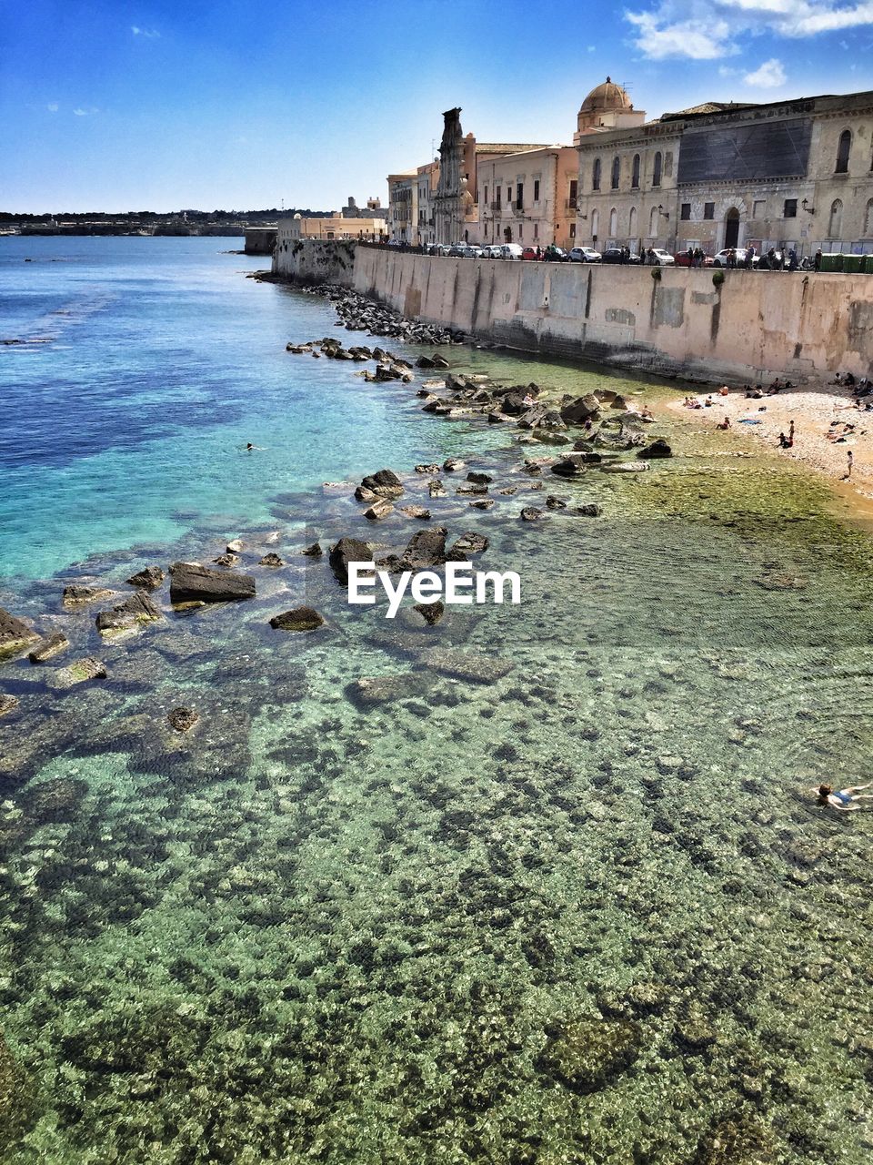 VIEW OF ROCKS IN SEA