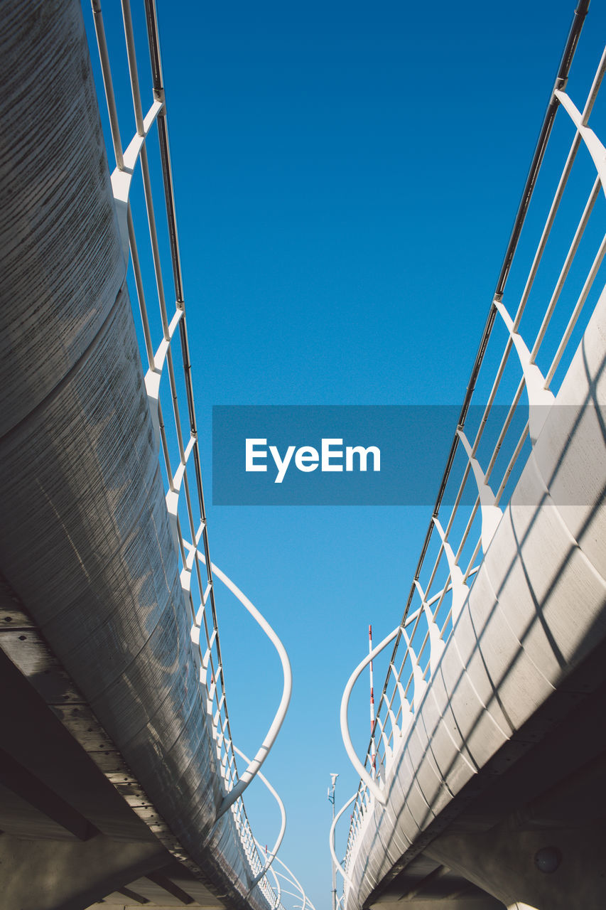 Low angle view of built structure against blue sky