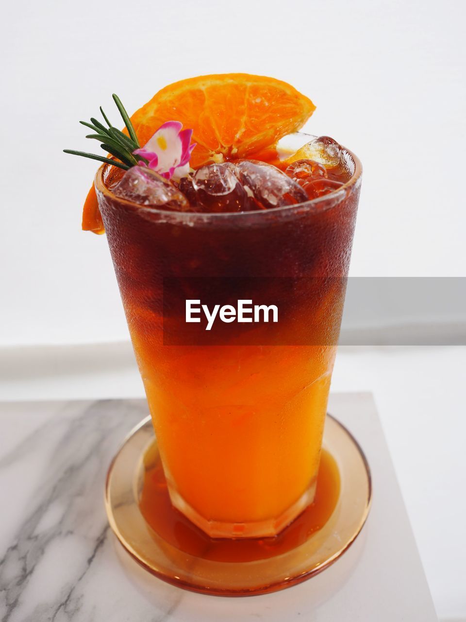 CLOSE-UP OF DRINK ON TABLE