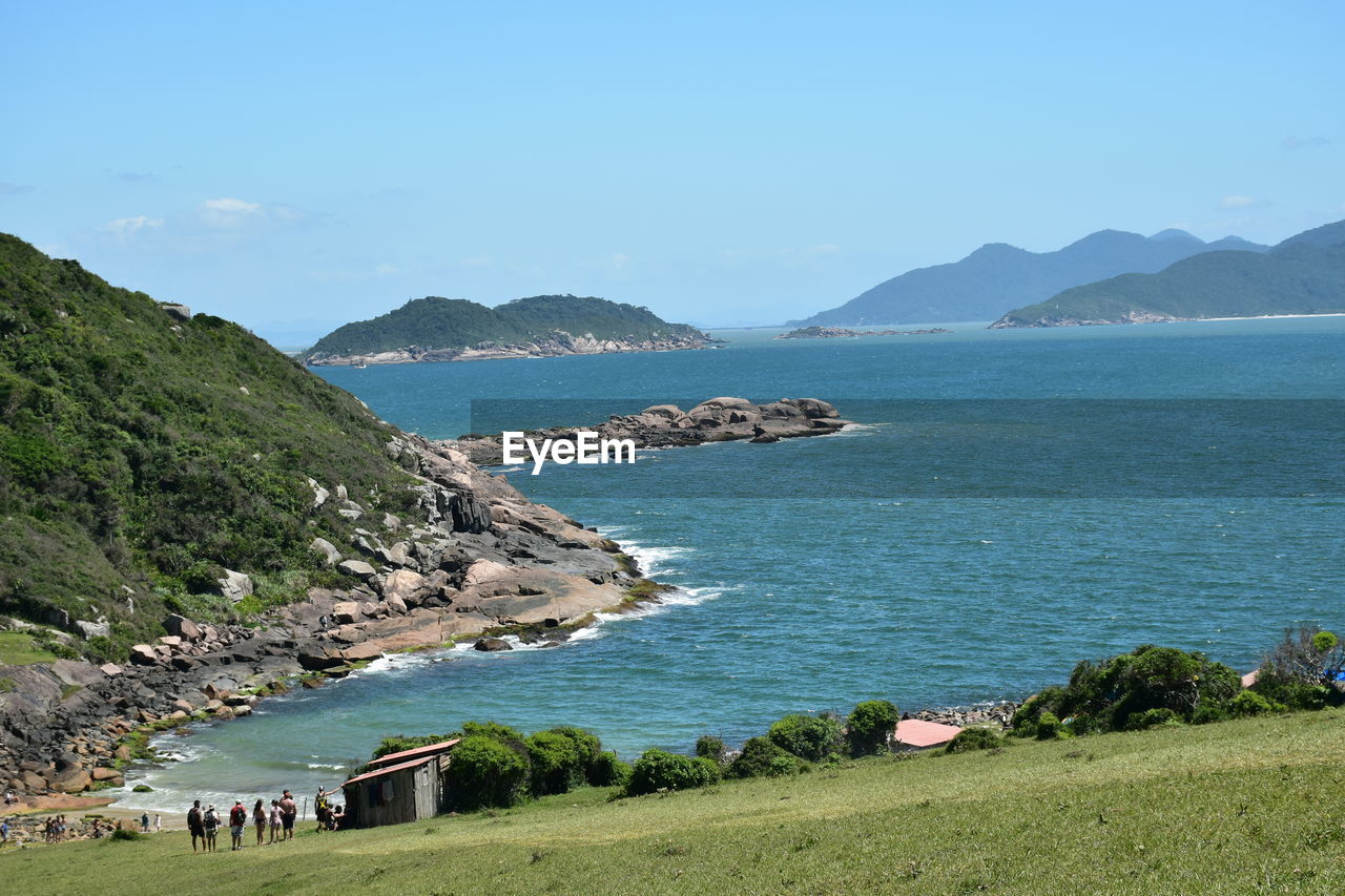 SCENIC VIEW OF SEA AND MOUNTAIN