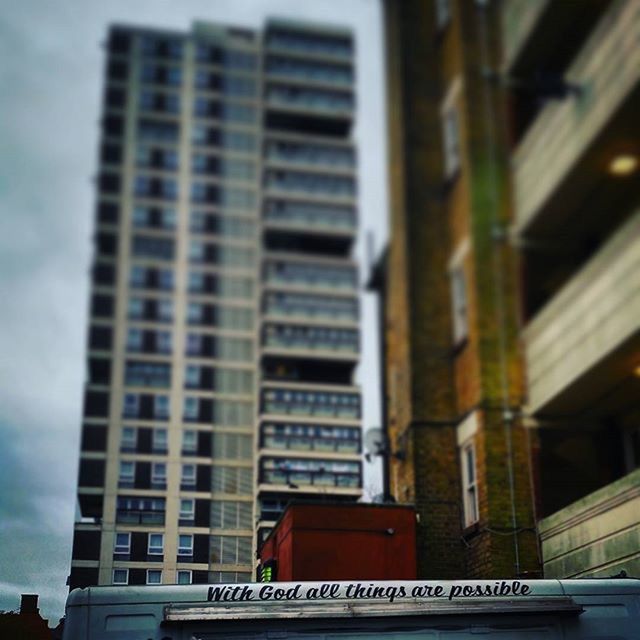 LOW ANGLE VIEW OF BUILDINGS IN CITY