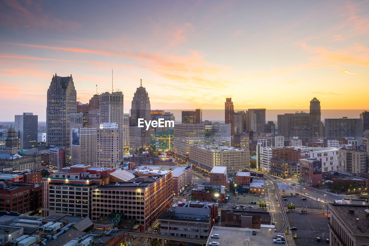 CITYSCAPE AGAINST SKY DURING SUNSET