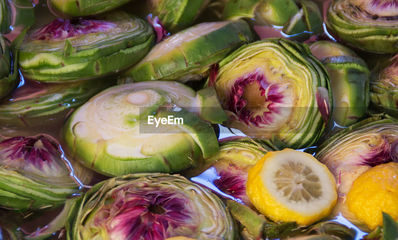 Close-up of artichoke slices in water