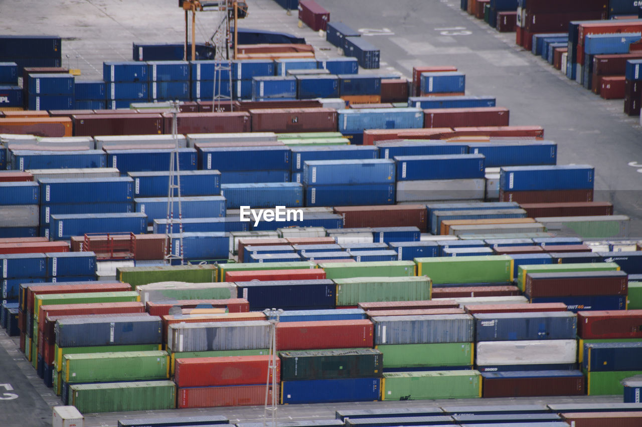 Stack of commercial docks with cargo container 