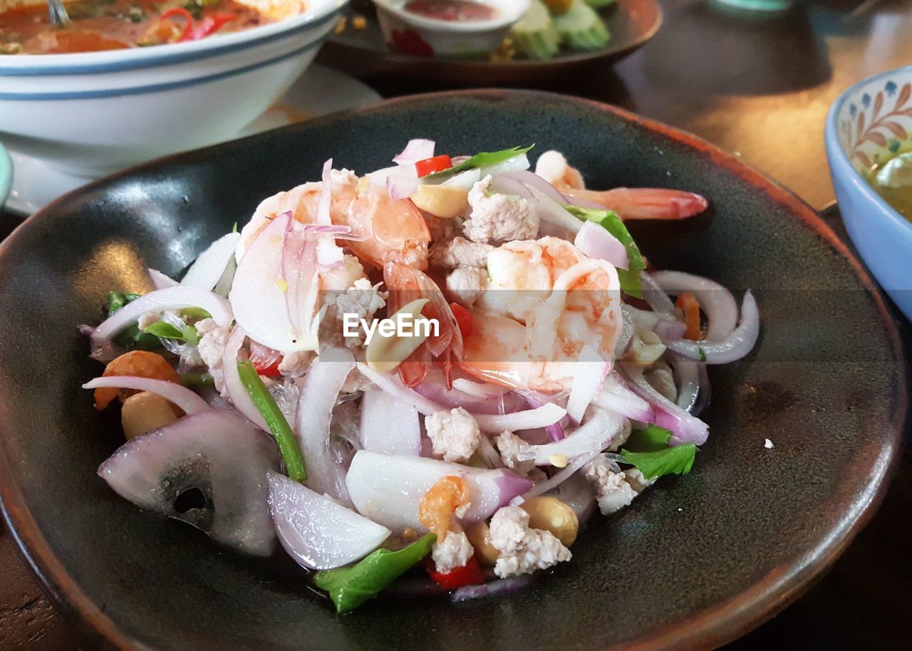 CLOSE-UP OF FOOD ON TABLE