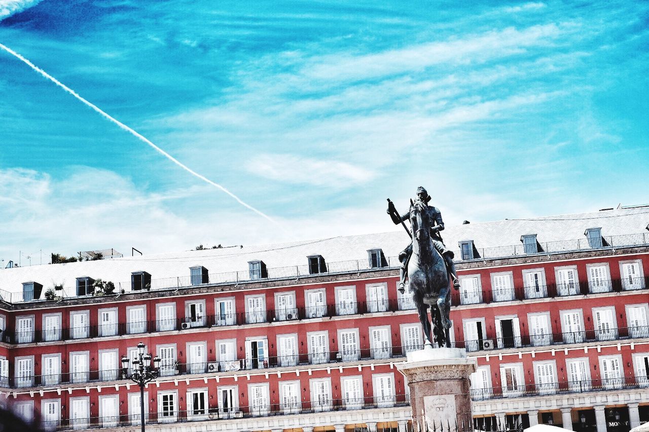 LOW ANGLE VIEW OF BUILDINGS AGAINST SKY