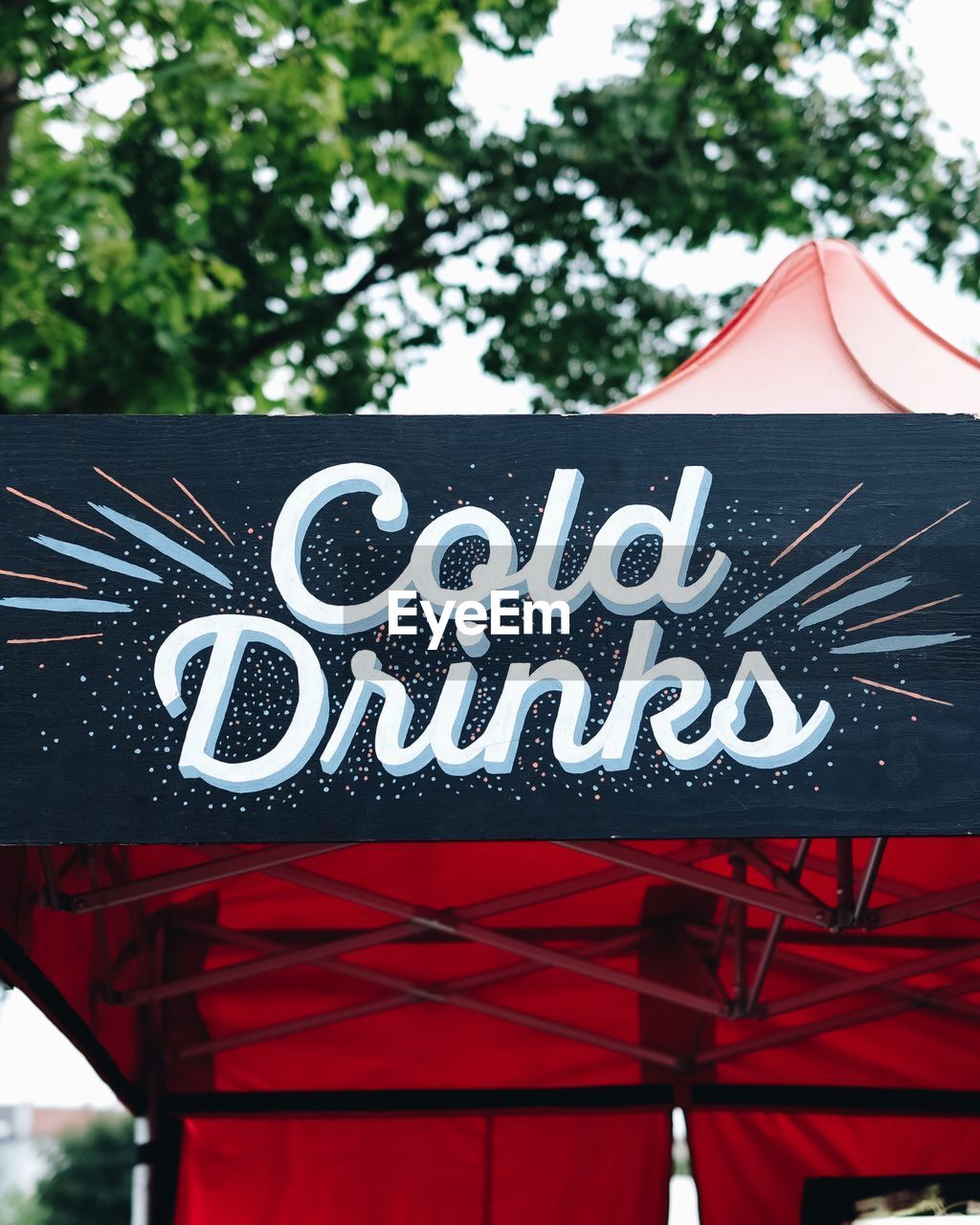 Low angle view of cold drinks text on banner