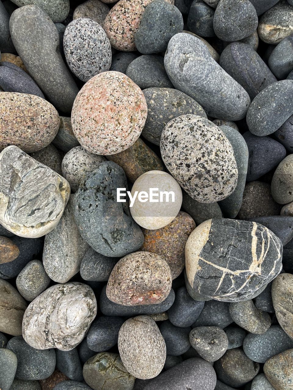 pebble, gravel, full frame, rock, backgrounds, large group of objects, abundance, stone, no people, high angle view, nature, textured, beach, shape, close-up, variation, gray, land, still life, day, outdoors, pattern, soil