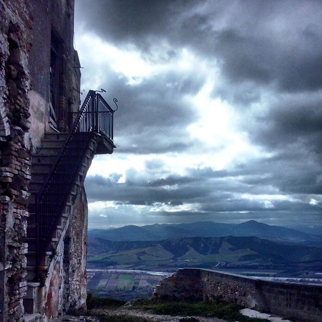 VIEW OF CLOUDY SKY OVER OLD RUIN